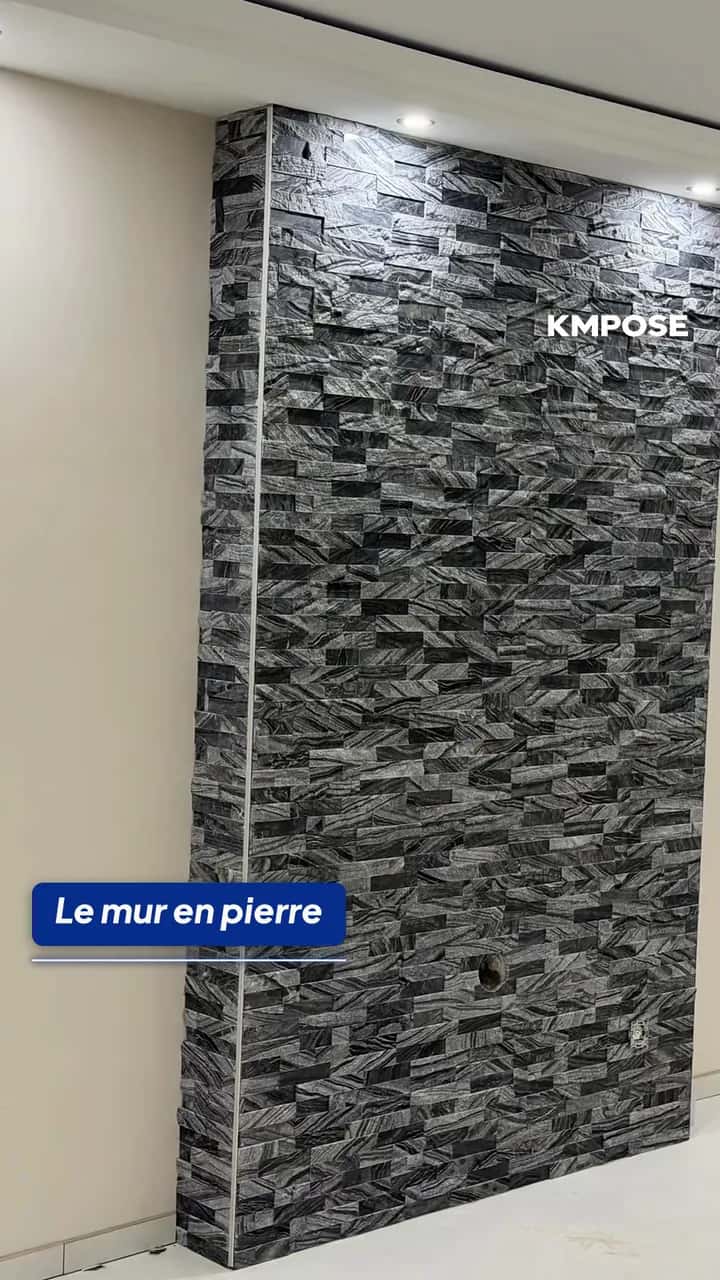 Vidéo d'un séjour en grand format et de toilettes en marbre noir avec chevron, carrelés par Km pose à Quiévrain
